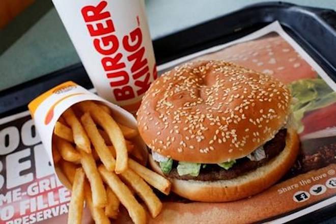 A Burger King Whopper meal combo is shown at a restaurant in Punxsutawney, Pa., on February 1, 2018. At least one quick-service restaurant company with hundreds of locations across Canada may stop requiring its franchisees to sign agreements prohibiting them from hiring employees from another franchisee. The so-called no-poach clause is “common,” but has recently caused concern it may stifle wages and prompted a rethinking of practices by large operators. THE CANADIAN PRESS/AP, Gene J. Puskar